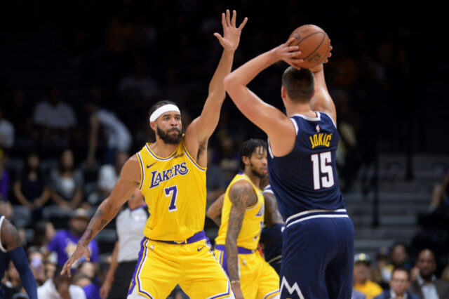 Los Angeles Lakers center JaVale McGee (7) defends Denver Nuggets center Nikola Jokic (15) during the first quarter at Valley View Casino Center.