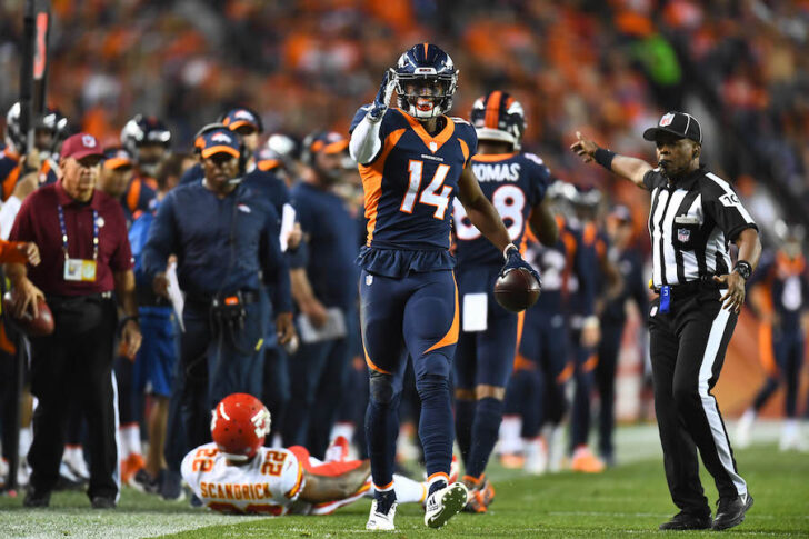 Denver Broncos wide receiver Courtland Sutton (14) signals a first down after making a reception in the second quarter against the Kansas City Chiefs at Broncos Stadium at Mile High.