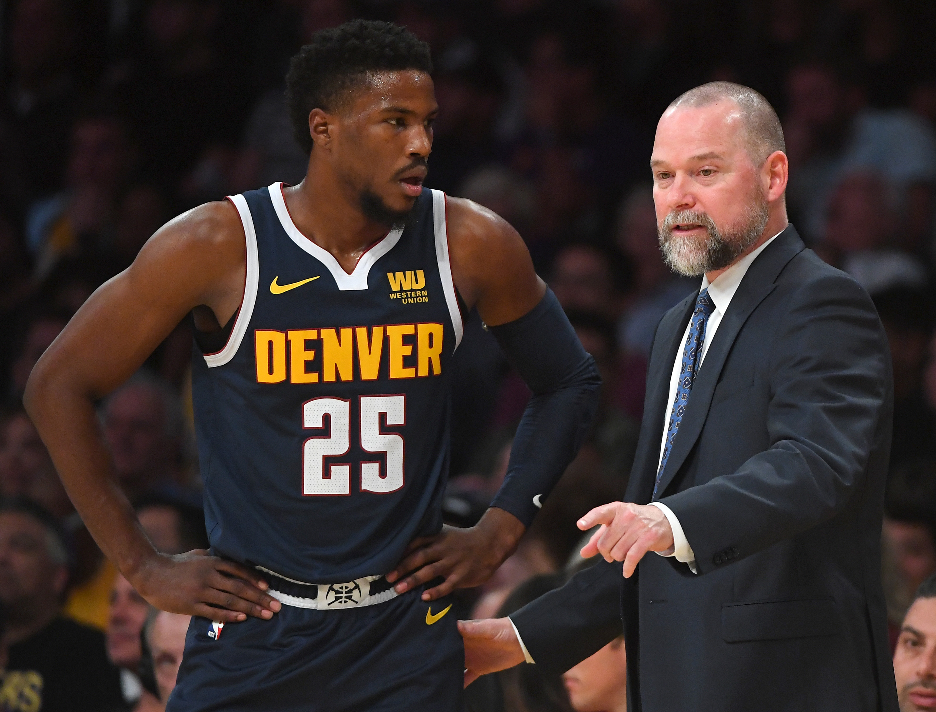 NBA: Preseason-Denver Nuggets at Los Angeles Lakers Denver Nuggets guard Malik Beasley (25) talks with head coach Michael Malone (right) in the first half of the game against the Los Angeles Lakers at Staples Center.