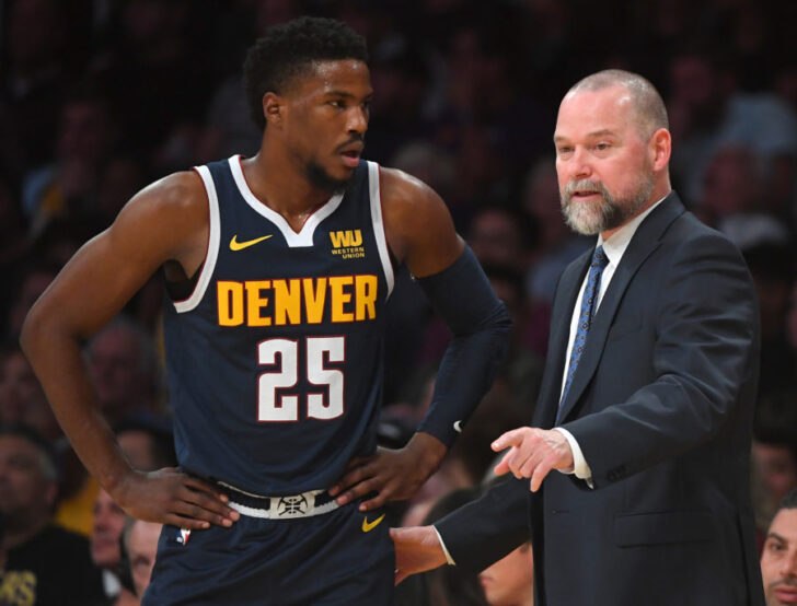 Denver Nuggets guard Malik Beasley (25) talks with head coach Michael Malone (right) in the first half of the game against the Los Angeles Lakers at Staples Center.
