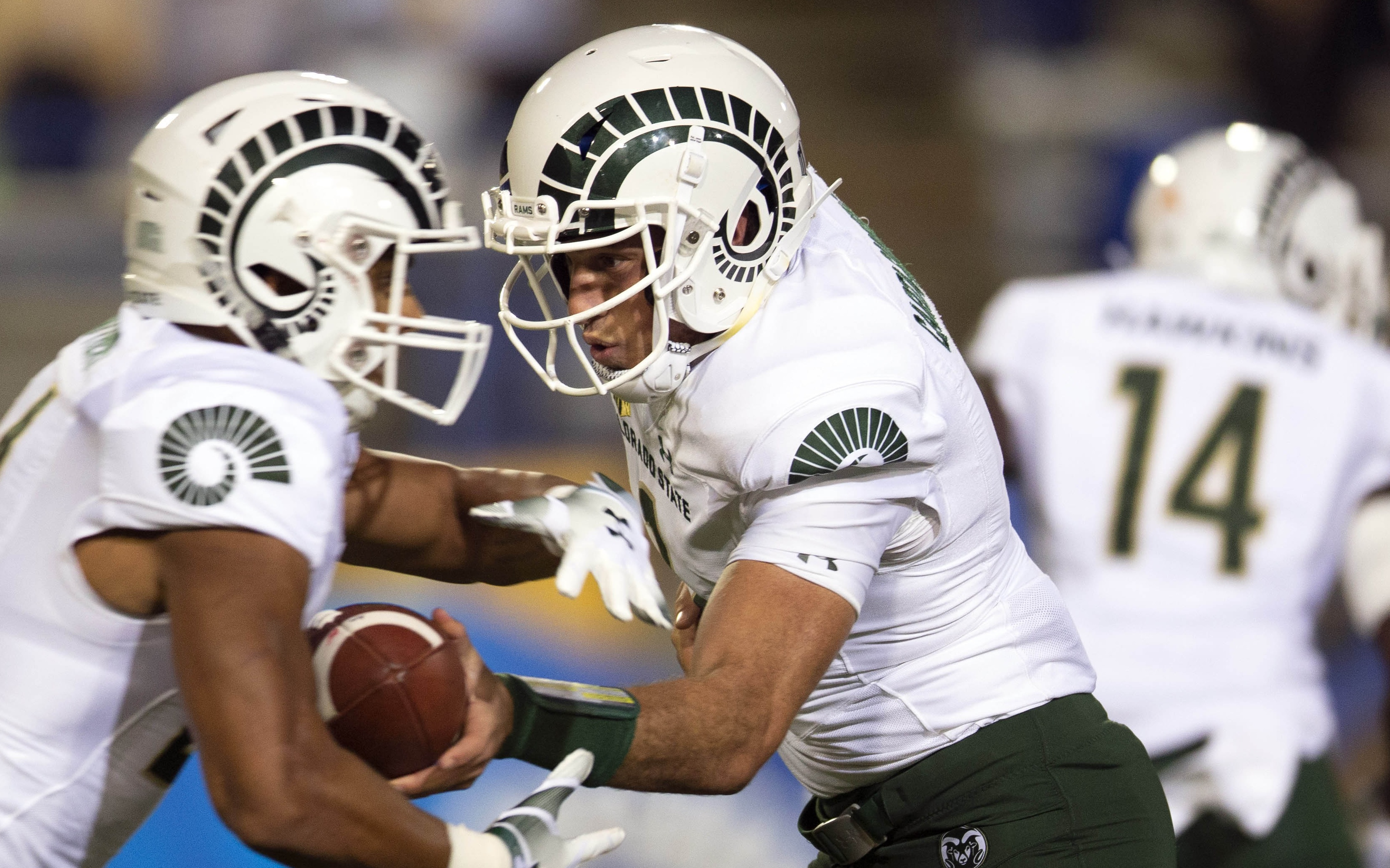 USATSI_11393051 Cropped K.J. Carta-Samuels hands off to Izzy Matthews. Credit: D. Ross Cameron, USA TODAY Sports.
