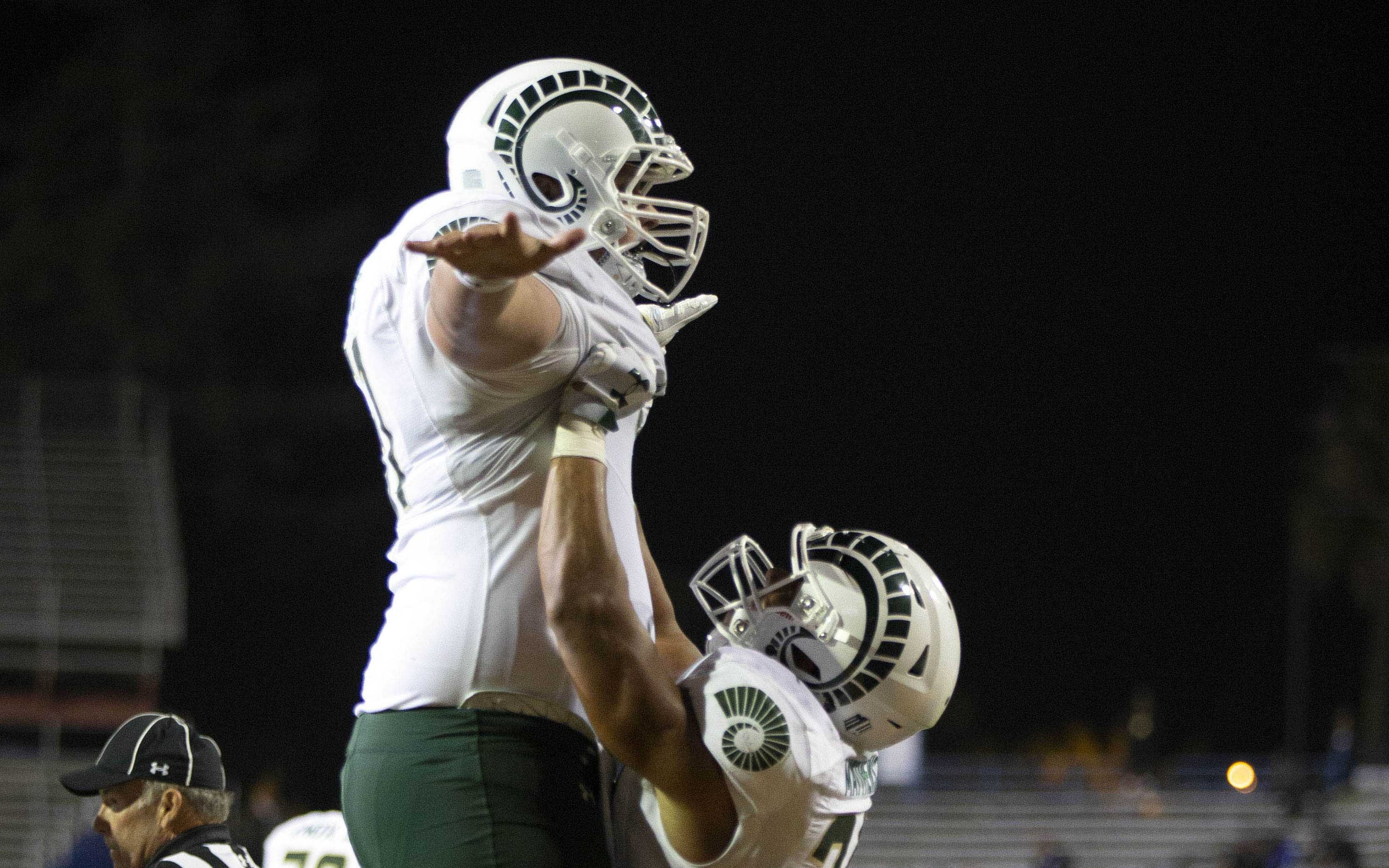 USATSI_11395089 Cropped Colby Meeks lifted by Izzy Matthews. Credit: D. Ross Cameron, USA TODAY Sports.