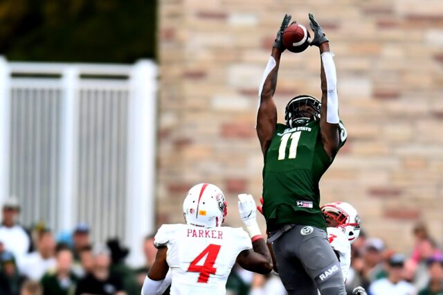 Preston Williams goes high for a touchdown. Credit: Ron Chenoy, USA TODAY Sports.