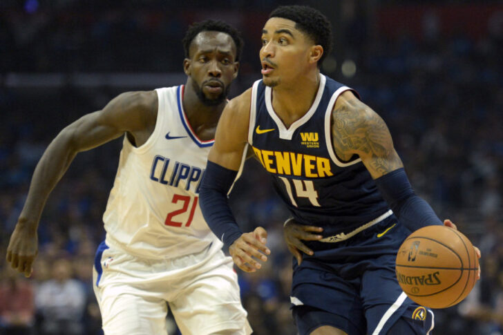 Denver Nuggets guard Gary Harris (14) dribbles against LA Clippers guard Patrick Beverley (21) during the second quarter at Staples Center.