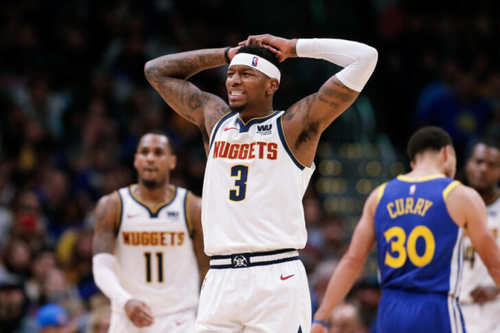 Denver Nuggets forward Torrey Craig (3) reacts after a play in the second quarter against the Golden State Warriors at the Pepsi Center.