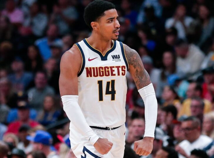 Denver Nuggets guard Gary Harris (14) reacts after a play in the fourth quarter against the Golden State Warriors at the Pepsi Center.