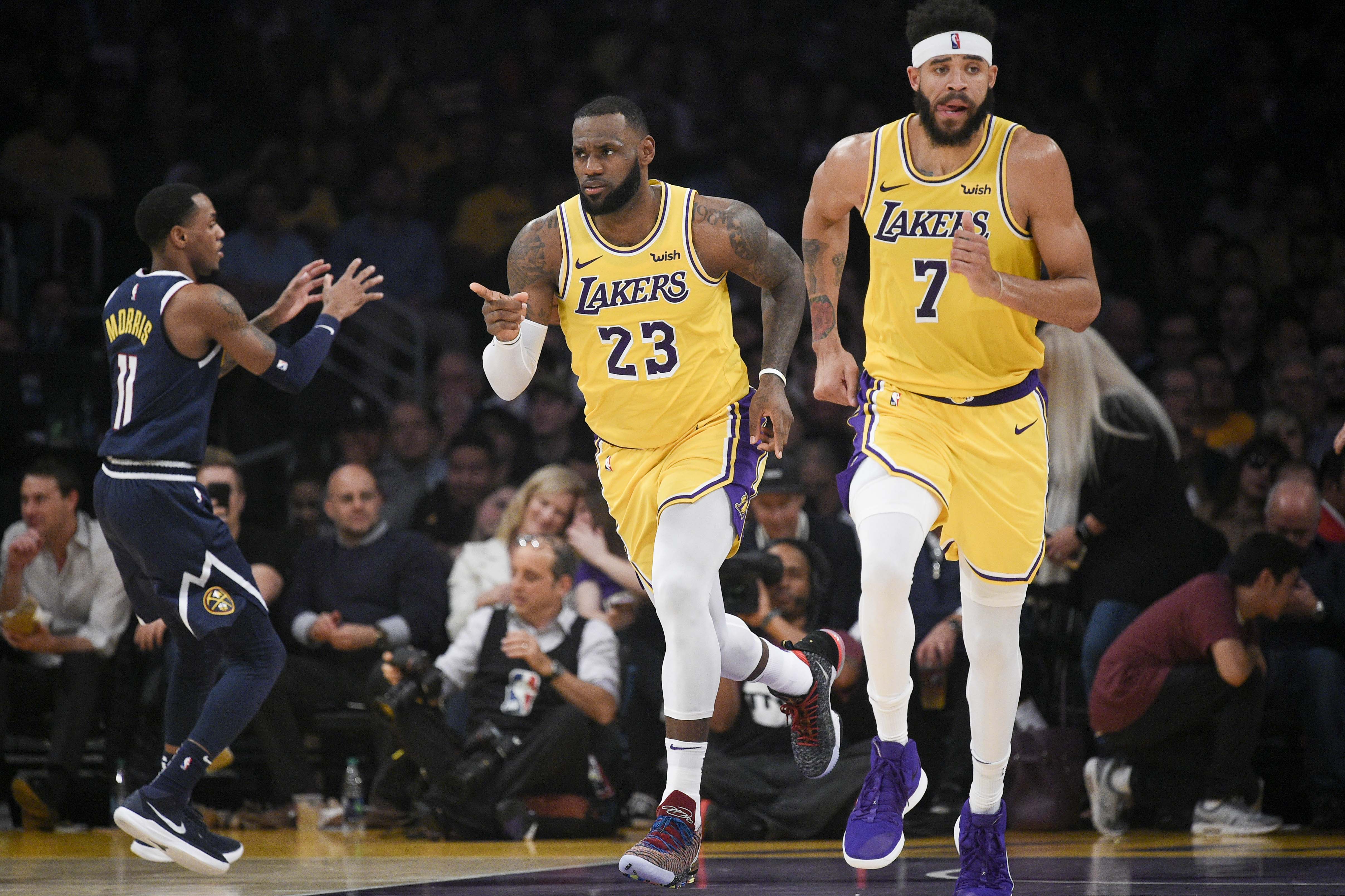 NBA: Denver Nuggets at Los Angeles Lakers Los Angeles Lakers forward LeBron James (23) reacts after a shot during the first half against the Denver Nuggets at Staples Center.
