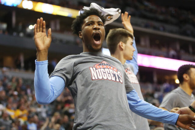 Denver Nuggets guard Malik Beasley (25) reacts from the bench during the second half against the Detroit Pistons at Pepsi Center. The Pistons won 106-95.