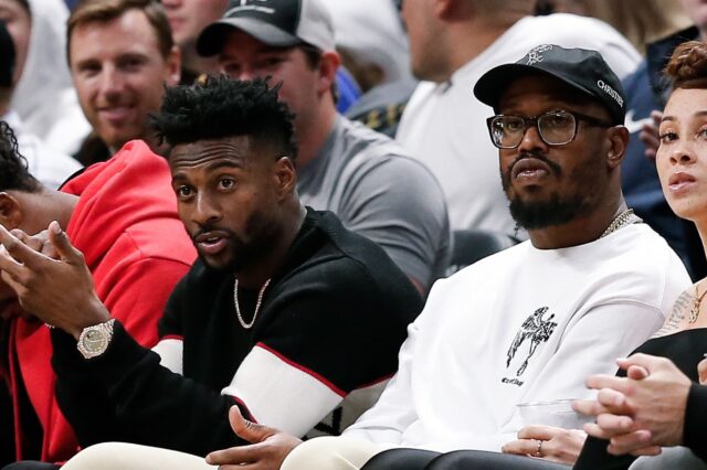 Von Miller and Emmanuel Sanders at a Nuggets game. Credit: Isaiah J. Downing, USA TODAY Sports.