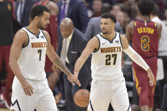 Denver Nuggets forward Trey Lyles (7) and guard Jamal Murray (27) celebrate in the second quarter against the Cleveland Cavaliers at Quicken Loans Arena.