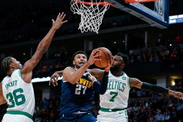 Boston Celtics guard Marcus Smart (36) and guard Jaylen Brown (7) defend against Denver Nuggets guard Jamal Murray (27) in the fourth quarter at Pepsi Center.