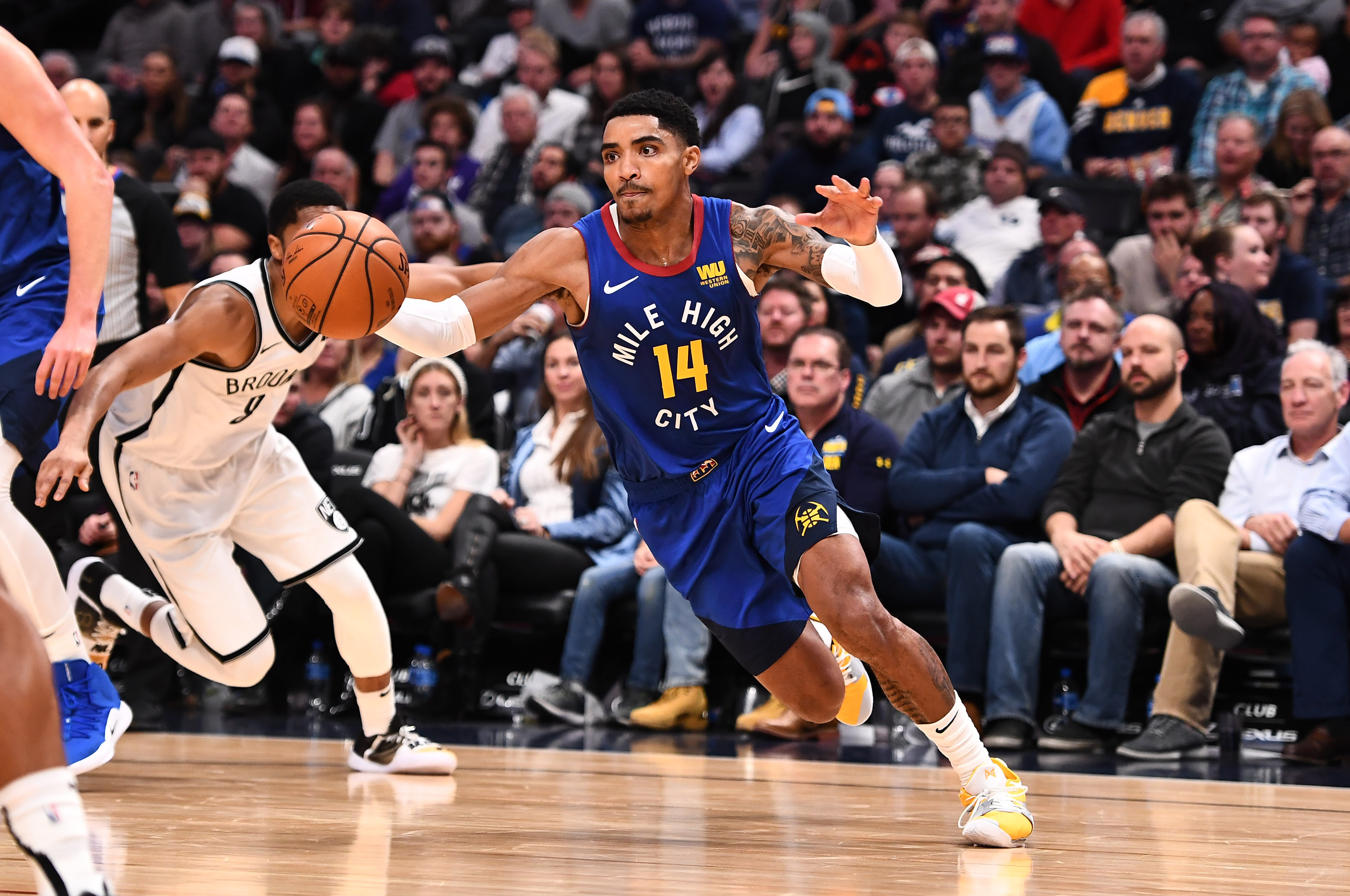 NBA: Brooklyn Nets at Denver Nuggets Denver Nuggets guard Gary Harris (14) drives to the basket in the second half against the Denver Nuggets at the Pepsi Center.