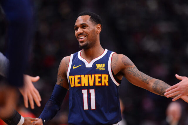 Denver Nuggets guard Monte Morris (11) reacts after scoring in the second half against the Atlanta Hawks at the Pepsi Center.