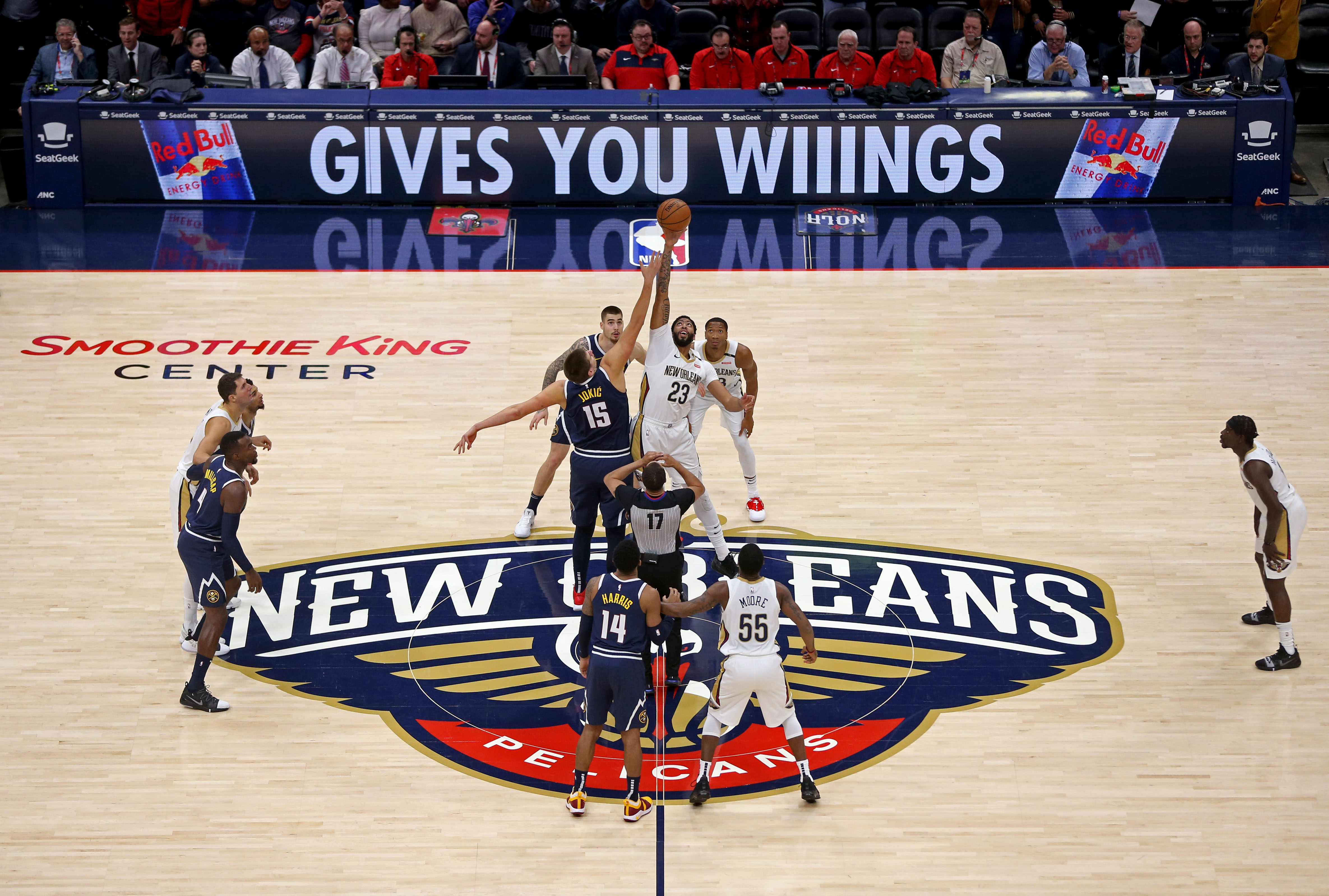 NBA: Denver Nuggets at New Orleans Pelicans Denver Nuggets center Nikola Jokic (15) jumps with New Orleans Pelicans forward Anthony Davis (23) to start the game at the Smoothie King Center.