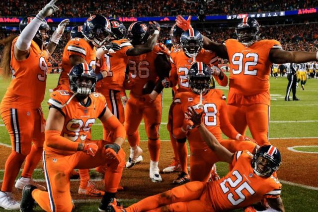 Broncos defense celebrates Shelby Harris' interception to win the game. Credit: Isaiah J. Downing, USA TODAY Sports.