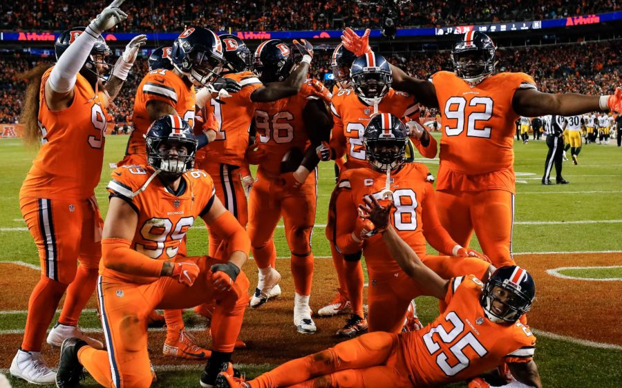 Broncos defense celebrates Shelby Harris' interception to win the game. Credit: Isaiah J. Downing, USA TODAY Sports.