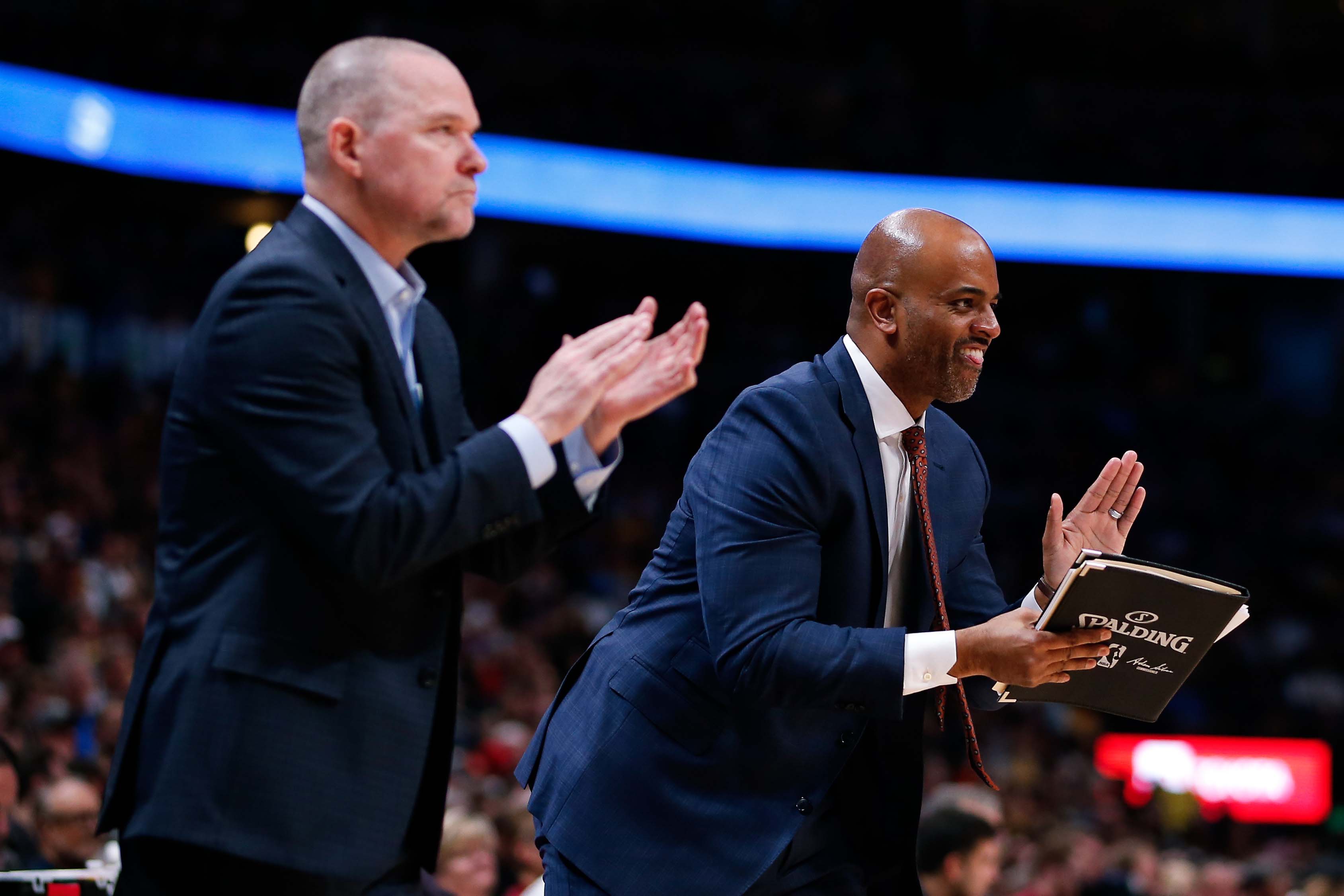 NBA: Los Angeles Lakers at Denver Nuggets Denver Nuggets assistant coach Wes Unseld Jr. (R) and head coach Michael Malone react after a play in the fourth quarter against the Los Angeles Lakers at the Pepsi Center.