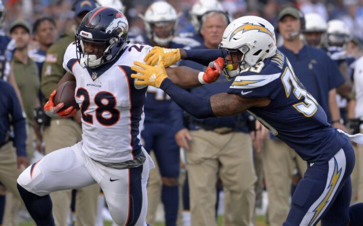Royce Freeman runs with power against the Chargers. Credit: Jake Roth, USA TODAY Sports.