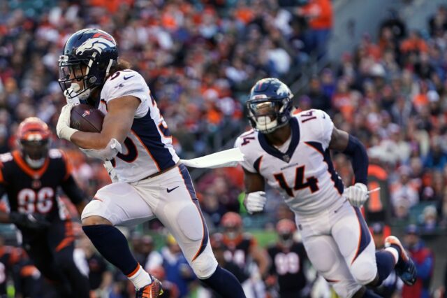 Phillip Lindsay and Courtland Sutton run. Credit: Aaron Doster, USA TODAY Sports.