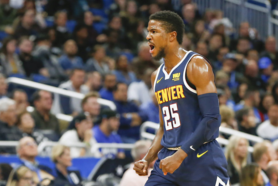 Denver Nuggets guard Malik Beasley (25) celebrates a three point basket during the second half against the Orlando Magic at Amway Center.