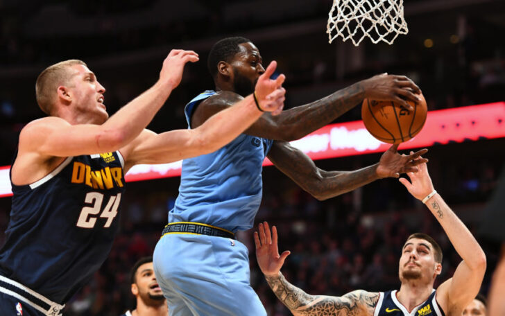 Dec 10, 2018; Denver, CO, USA; Memphis Grizzlies forward JaMychal Green (0) and Denver Nuggets forward Mason Plumlee (24) and forward Juan Hernangomez (41) go for a rebound in the second half at the Pepsi Center. Mandatory Credit: Ron Chenoy-USA TODAY Sports