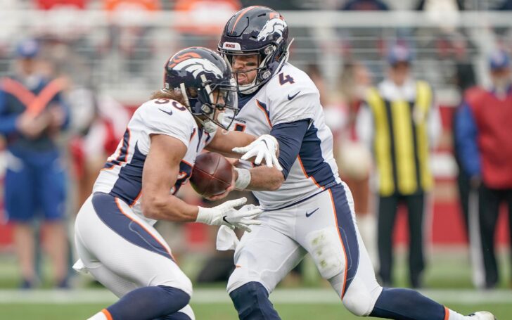 Case Keenum and Phillip Lindsay. Credit: Stan Szeto, USA TODAY Sports.