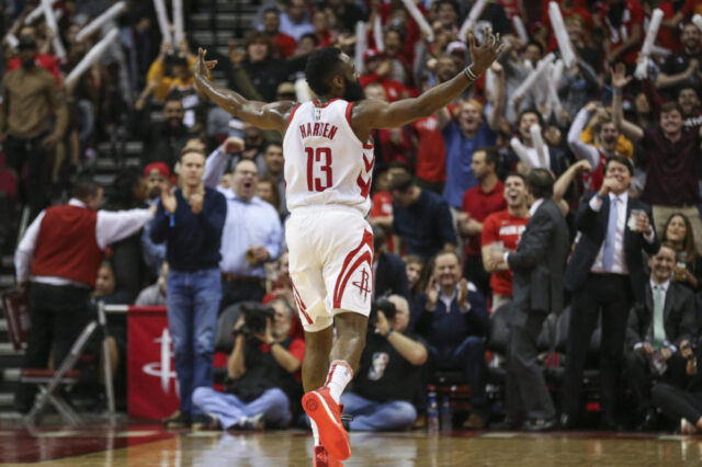 Houston Rockets guard James Harden (13) celebrates after scoring a basket during the second quarter against the Denver Nuggets at Toyota Center.