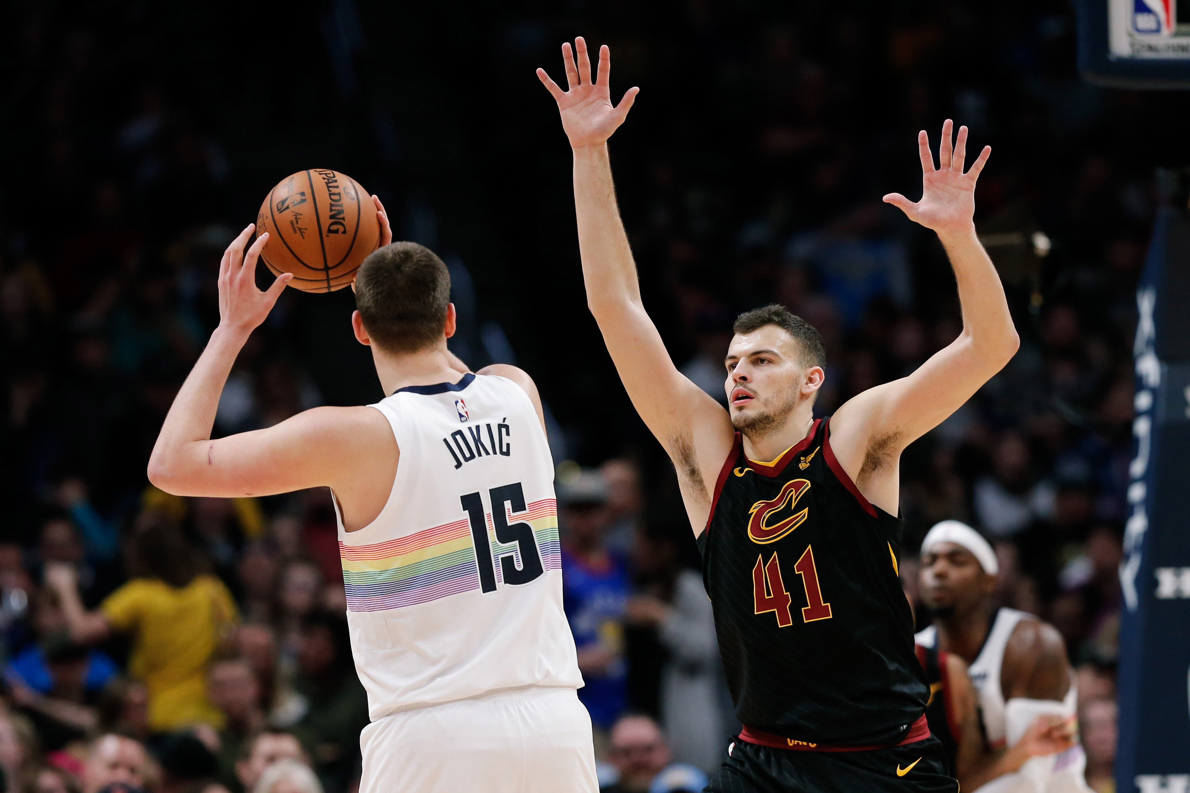 NBA: Cleveland Cavaliers at Denver Nuggets Cleveland Cavaliers center Ante Zizic (41) guards Denver Nuggets center Nikola Jokic (15) in the second quarter at the Pepsi Center.