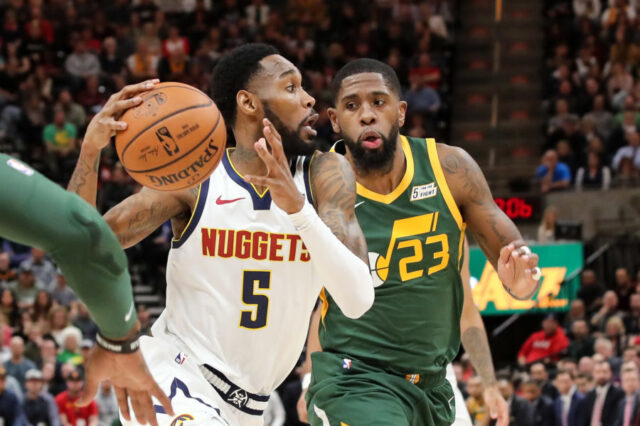 Denver Nuggets guard Will Barton (5) tries to get past Utah Jazz forward Royce O'Neale (23) and to the basket during the second quarter at Vivint Smart Home Arena.