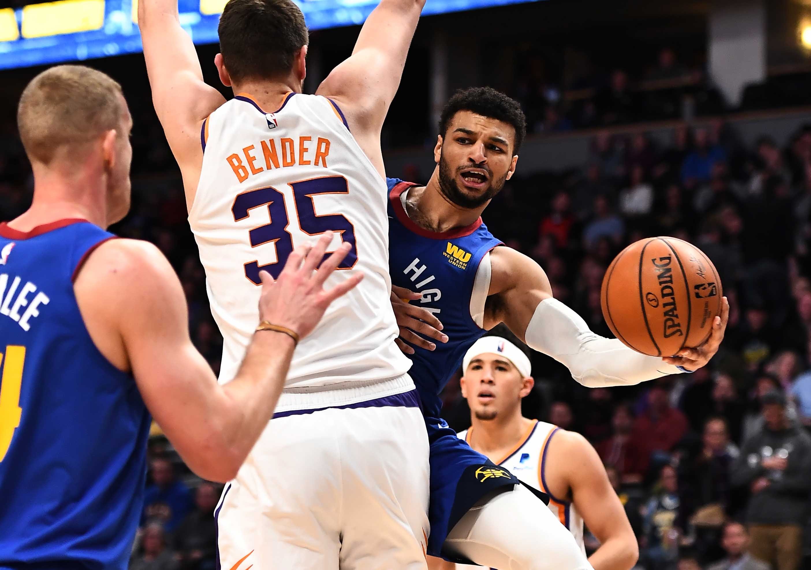 NBA: Phoenix Suns at Denver Nuggets Denver Nuggets guard Jamal Murray (27) attempts a pass behind Phoenix Suns forward Dragan Bender (35) in the second quarter at the Pepsi Center.