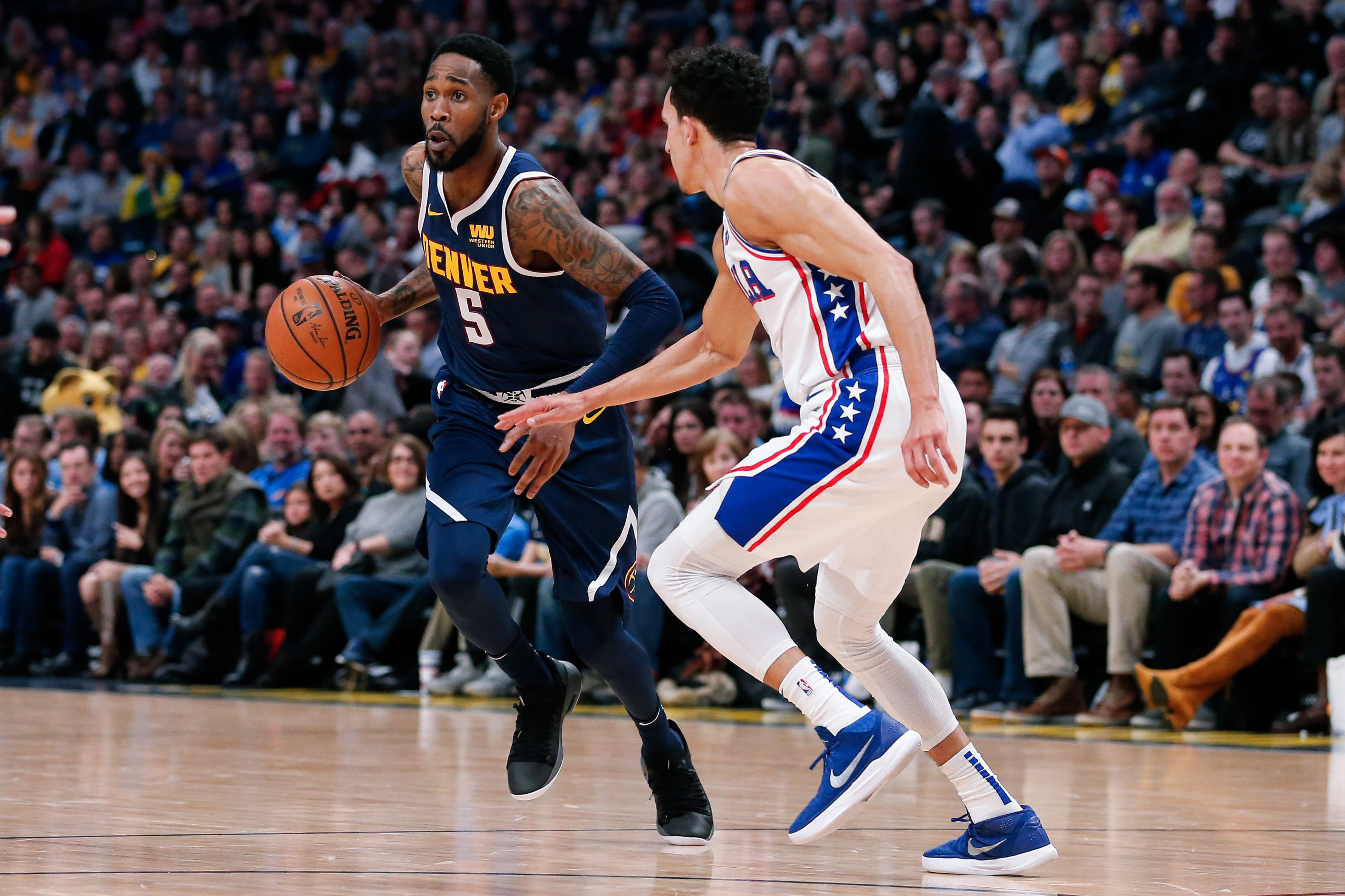 NBA: Philadelphia 76ers at Denver Nuggets Denver Nuggets guard Will Barton (5) dribbles the ball against Philadelphia 76ers guard Landry Shamet (1) in the second quarter at the Pepsi Center.