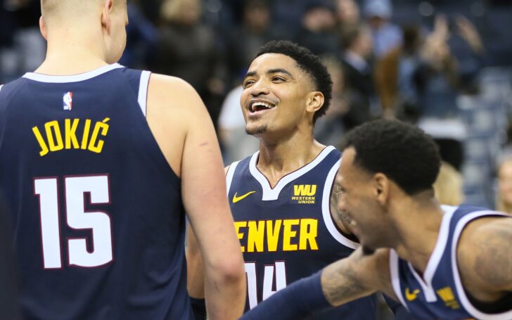 Nuggets celebrate near the end of the game. Credit: Nelson Chenault, USA TODAY Sports.