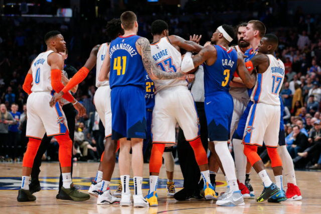 Denver Nuggets and Oklahoma City Thunder players shove each other after an altercation in the fourth quarter at the Pepsi Center.