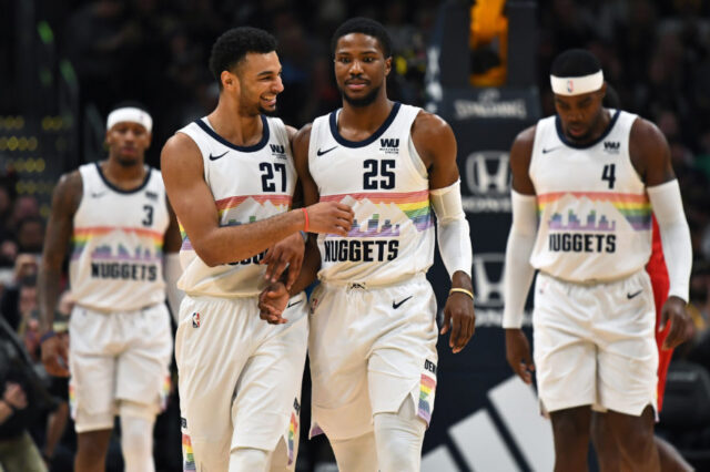 Denver Nuggets guard Malik Beasley (25) and guard Jamal Murray (27) celebrate a score in the second quarter against the Portland Trail Blazers at the Pepsi Center.
