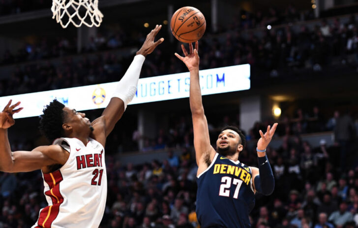 Denver Nuggets guard Jamal Murray (27) shoots over Miami Heat center Hassan Whiteside (21) in the second quarter at the Pepsi Center.
