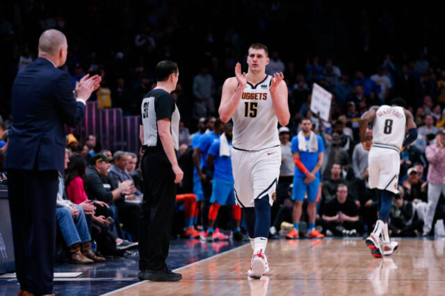 Denver Nuggets center Nikola Jokic (15) reacts as he comes off the court in the fourth quarter against the Oklahoma City Thunder at the Pepsi Center.