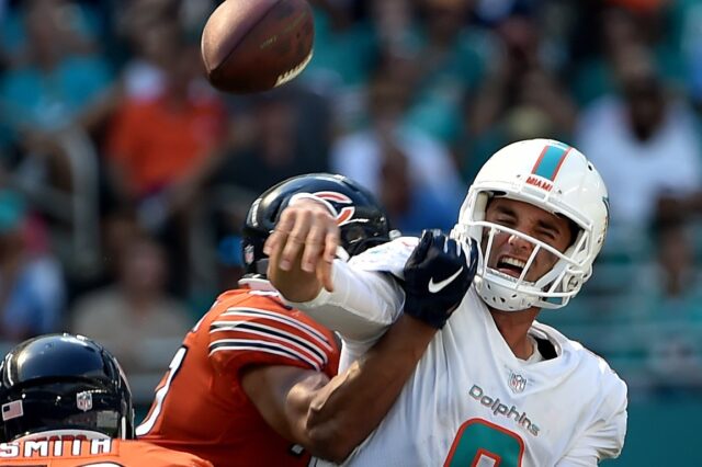 Callahan hits Brock Osweiler as he throws. Credit: Steve Mitchell, USA TODAY Sports.