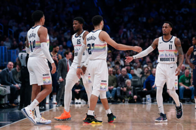 Denver Nuggets guard Gary Harris (14) and guard Jamal Murray (27) come onto the court for guard Malik Beasley (25) and guard Monte Morris (11) in the fourth quarter against the New Orleans Pelicans at the Pepsi Center.