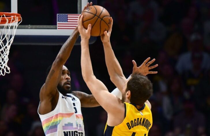 Denver Nuggets guard Will Barton (5) blocks a shot attempt by Indiana Pacers forward Bojan Bogdanovic (44) in the first quarter at the Pepsi Center.
