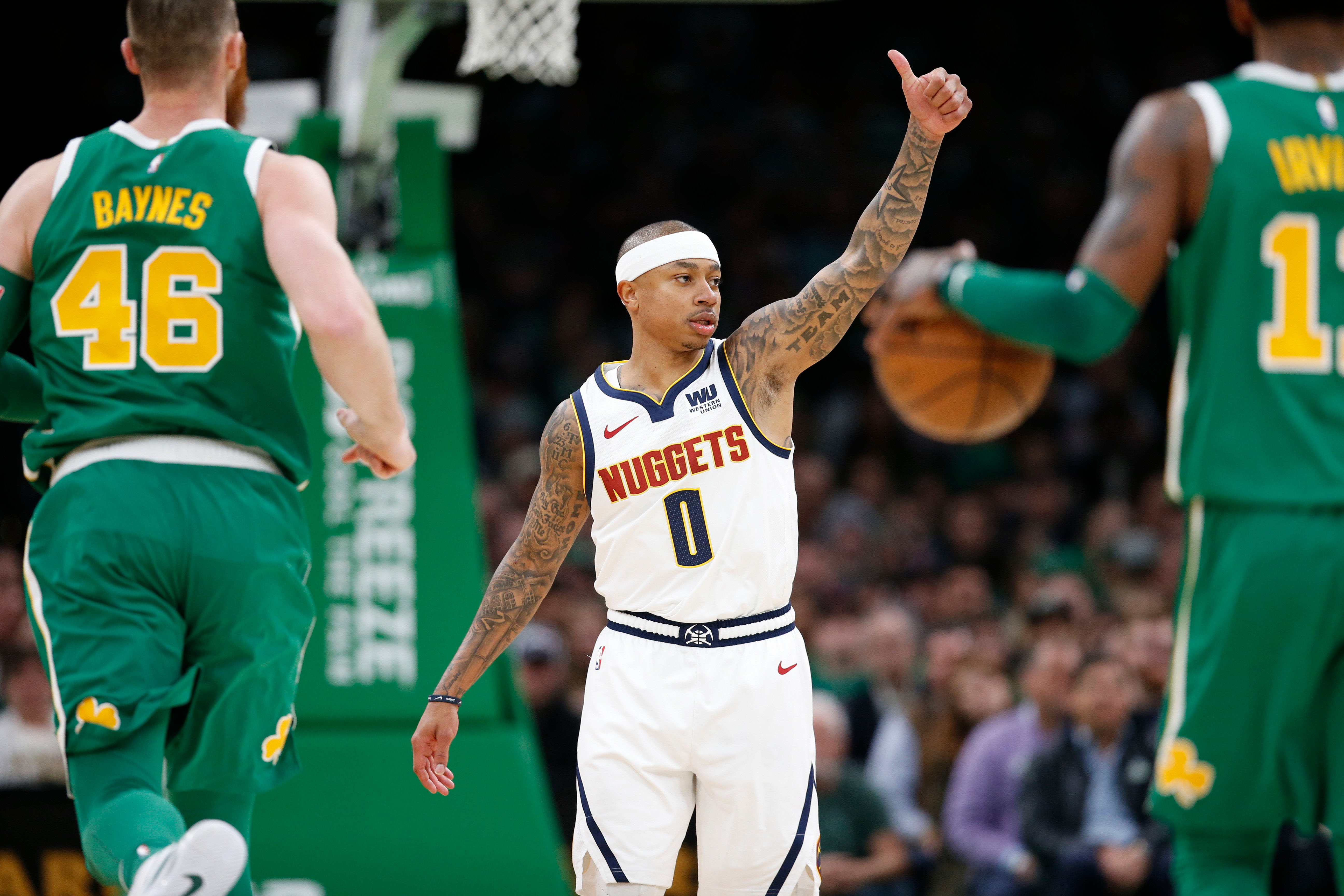 NBA: Denver Nuggets at Boston Celtics Denver Nuggets point guard Isaiah Thomas (0) signals to the bench during the first half against the Boston Celtics at TD Garden.
