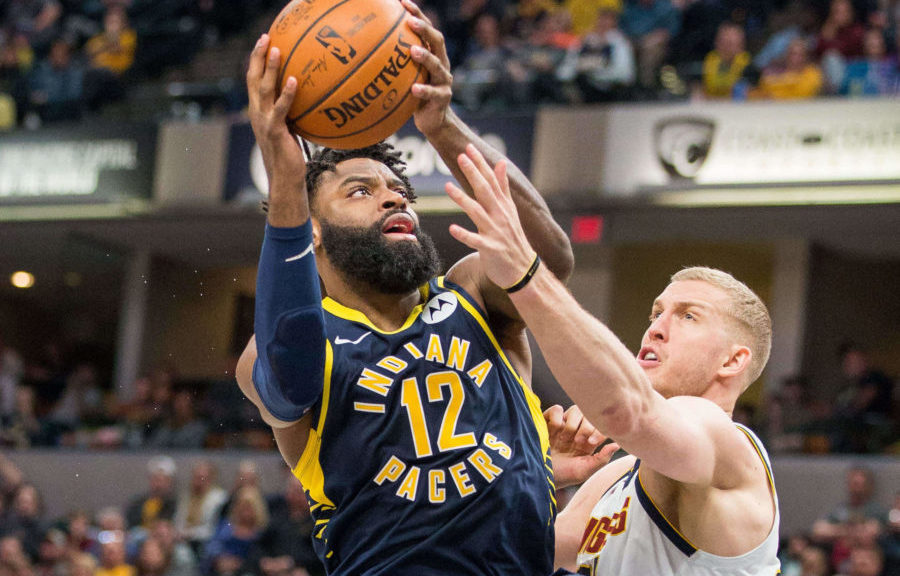 NBA: Denver Nuggets at Indiana Pacers ndiana Pacers guard Tyreke Evans (12) shoots the ball while Denver Nuggets forward Mason Plumlee (24) defends in the second half at Bankers Life Fieldhouse.