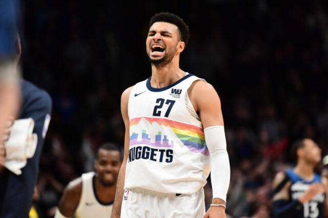 Denver Nuggets guard Jamal Murray (27) reacts after his three point basket in the fourth quarter against the Minnesota Timberwolves at the Pepsi Center.