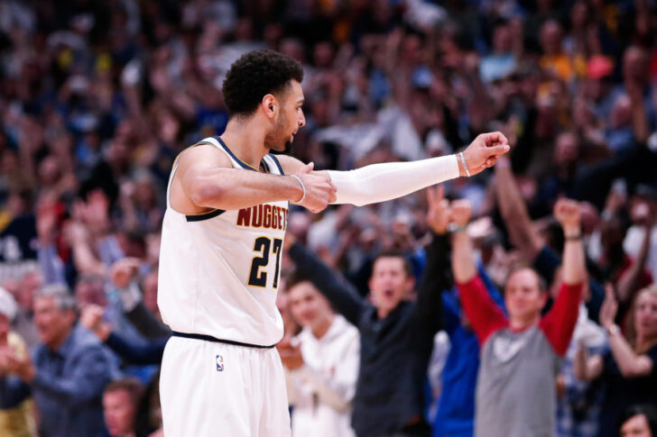Denver Nuggets guard Jamal Murray (27) reacts after a play against the San Antonio Spurs in the fourth quarter in game two of the first round of the 2019 NBA Playoffs at the Pepsi Center.