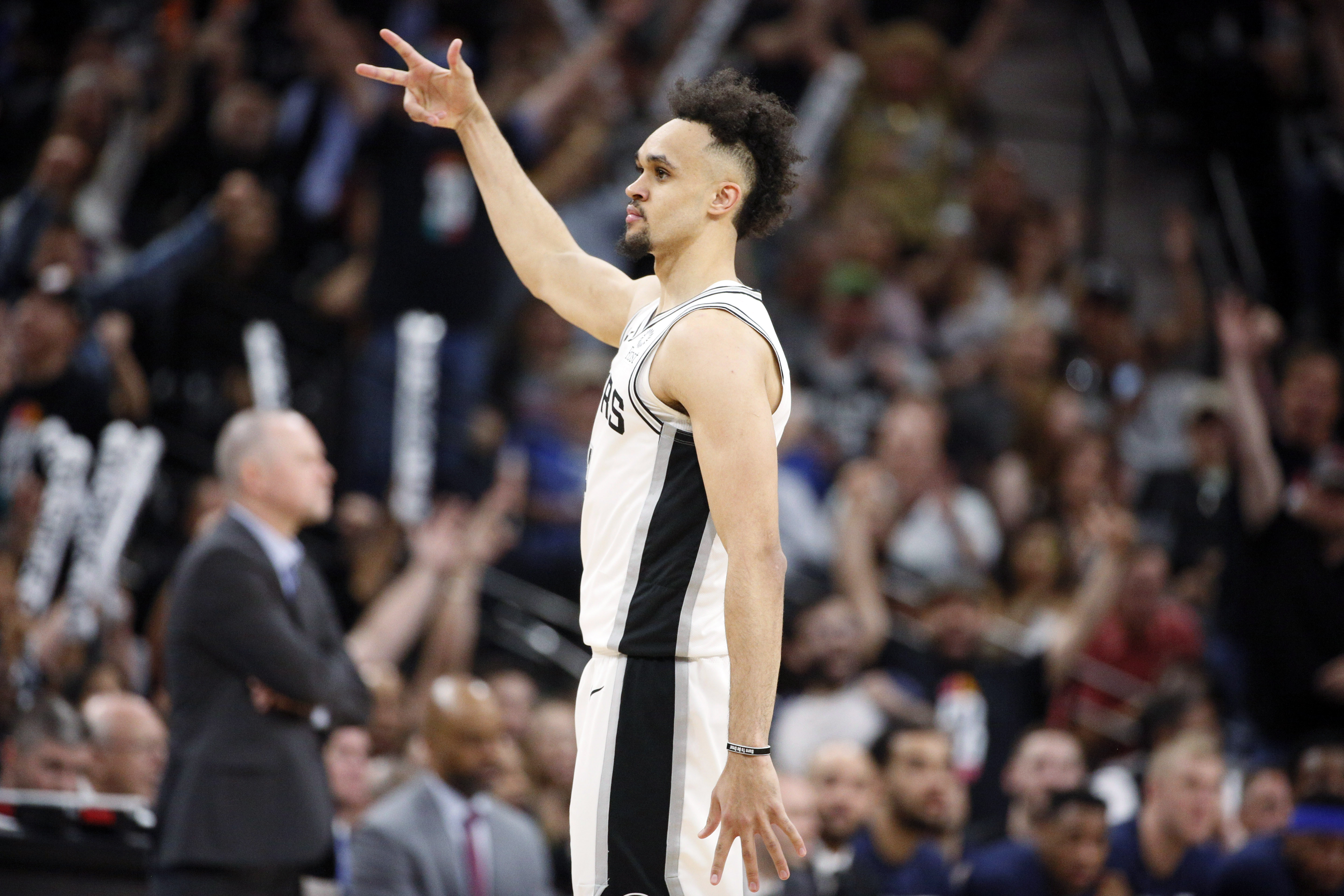 NBA: Playoffs-Denver Nuggets at San Antonio Spurs San Antonio Spurs point guard Derrick White (4) reacts after his three point basket against the Denver Nuggets in game three of the first round of the 2019 NBA Playoffs at AT&T Center.