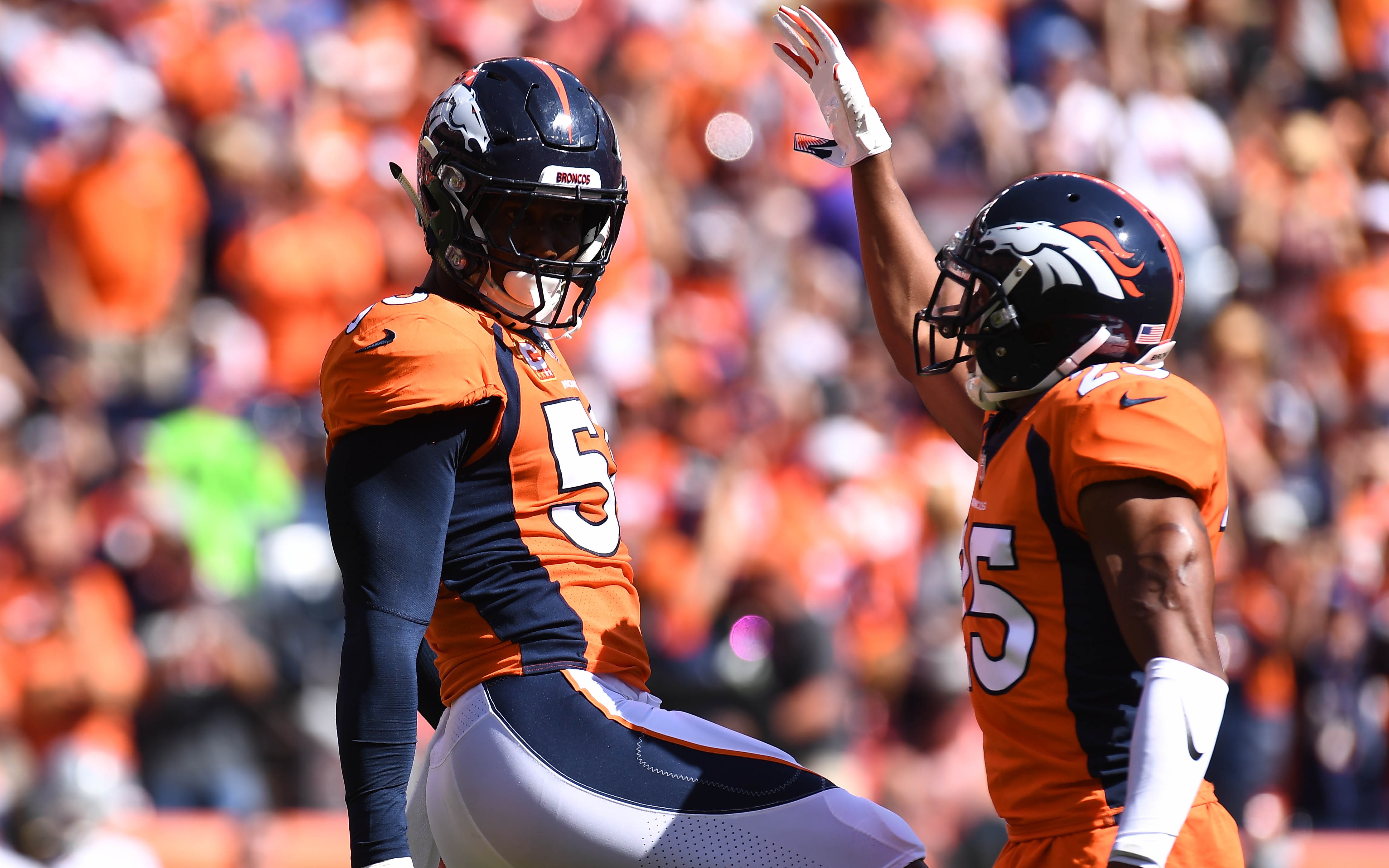 USATSI_11319684 Cropped Chris Harris and Von Miller celebrate. Credit: Ron Chenoy, USA TODAY Sports.