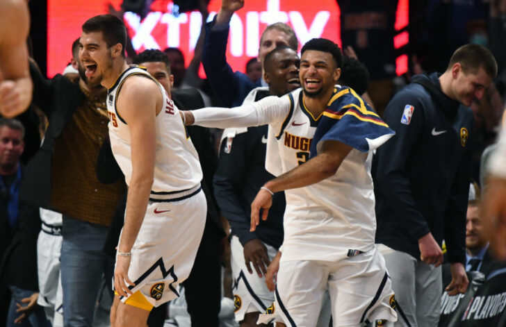 Denver Nuggets forward Juan Hernangomez (41) reacts to his successful three-point basket with guard Jamal Murray (27) in the fourth quarter against the Portland Trail Blazers in game five of the second round of the 2019 NBA Playoffs at Pepsi Center.