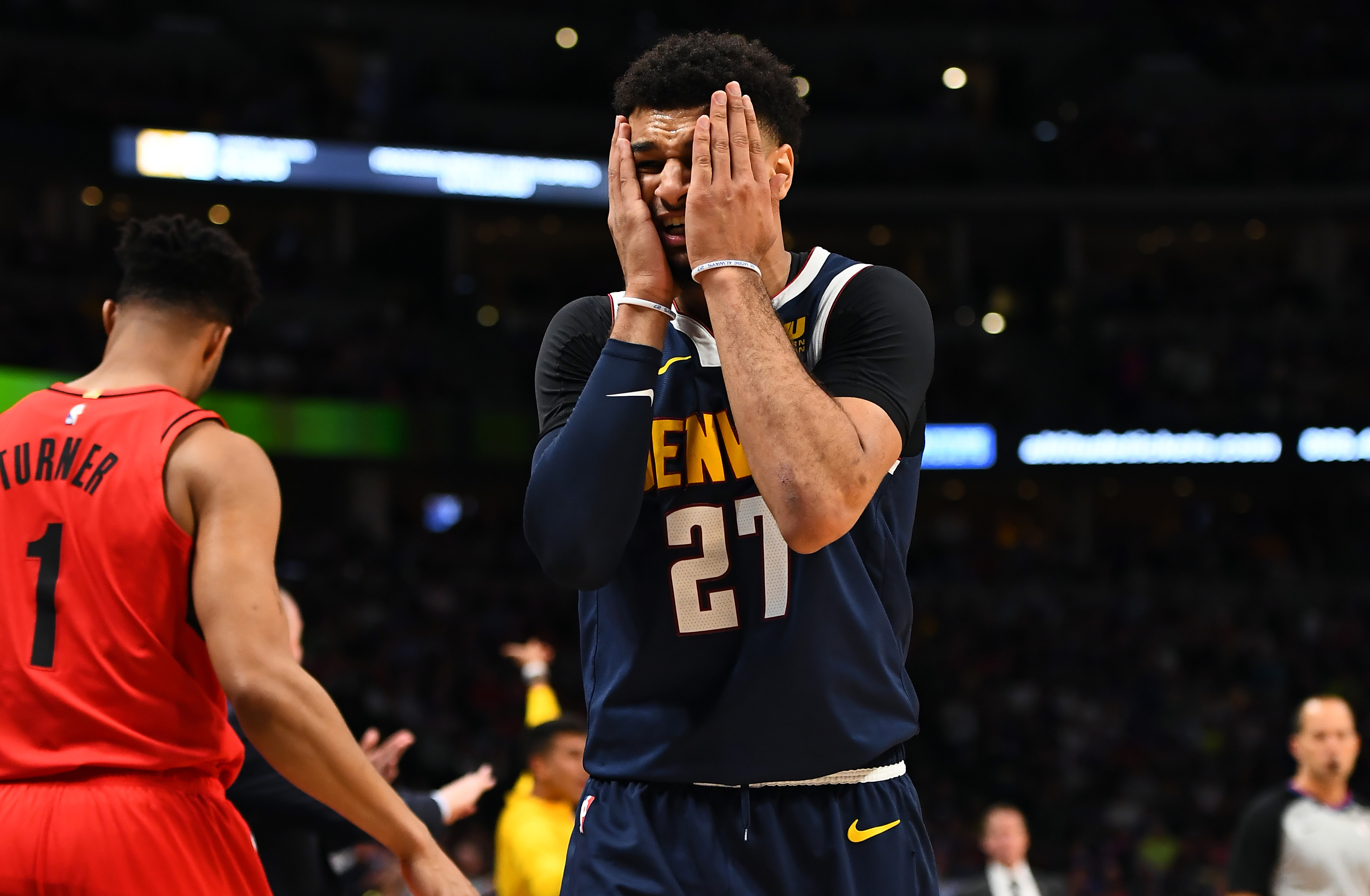 Denver Nuggets guard Jamal Murray (27) reacts in the second quarter against the Portland Trail Blazers in game seven of the second round of the 2019 NBA Playoffs at Pepsi Center.