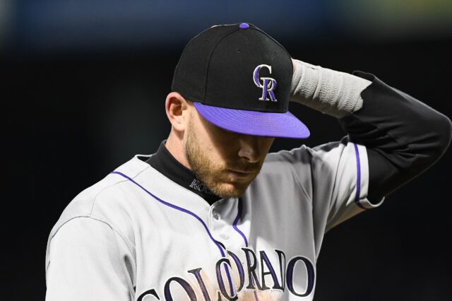 Trevor Story leaves due to injury in the 9th inning. Credit: Michael Fluharty, USA TODAY Sports.
