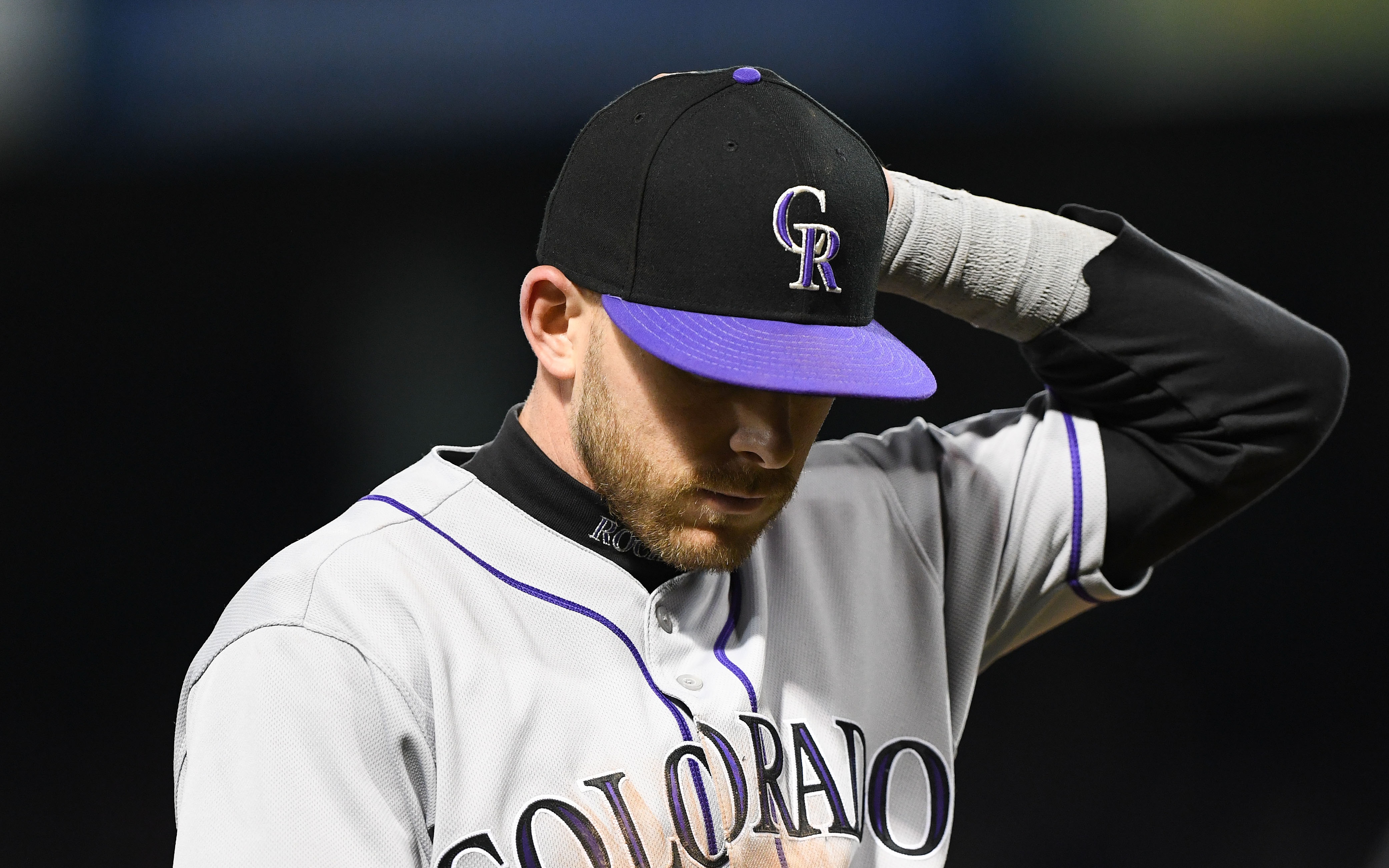 USATSI_12711188 Cropped Trevor Story leaves due to injury in the 9th inning. Credit: Michael Fluharty, USA TODAY Sports.