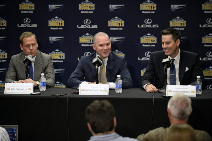Denver Nuggets head coach Michael Malone (center) and general manager GM Tim Connelly (left) and president Josh Kroenke (right) during a press conference at the Pepsi Center.